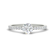 round diamond Pavé solitaire engagement ring in platinum